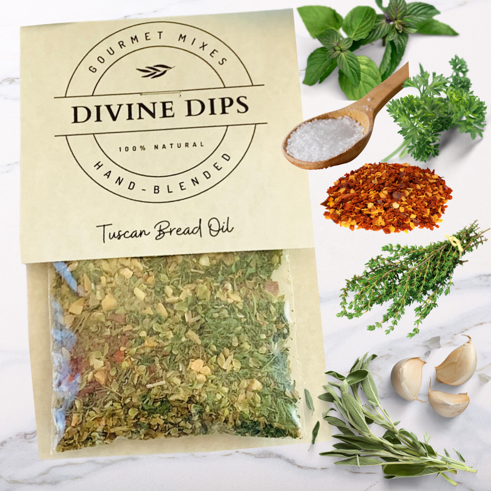 Tuscan Bread Oil seasoning dip mix in package with raw ingredients surrounding; oregano, parsley, salt, pepper, thyme, rosemary, garlic